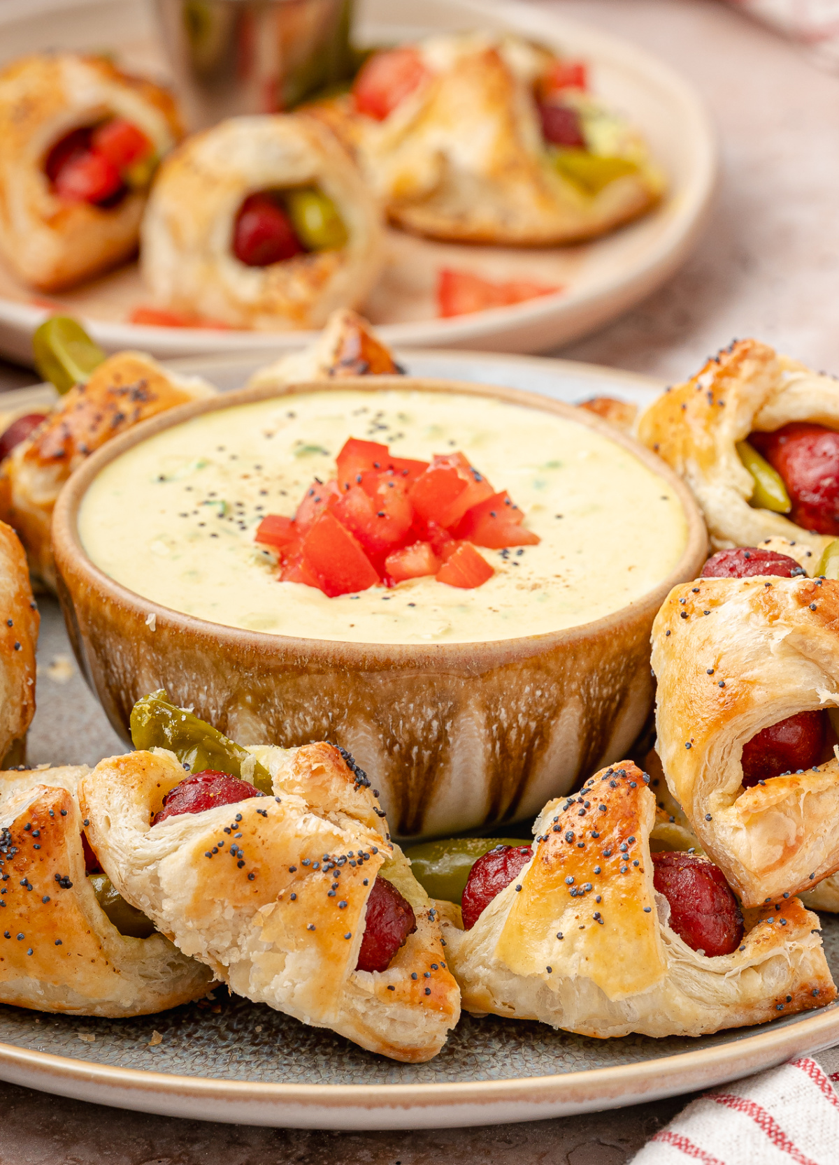 The mustard relish dip brings the onion, tomato, mustard, and relish flavors of a classic Chicago dog to every bite. mustard-relish-dip-for-chicago-hot-dog-pigs-in-a-blanket