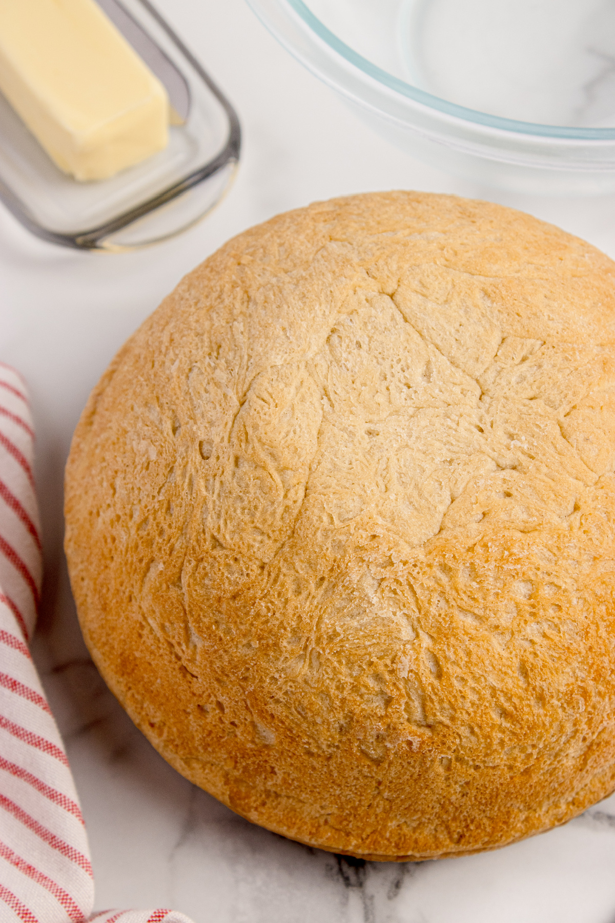 No-Knead Peasant Bread Baked in a Pyrex Bowl No-knead peasant bread baked in a Pyrex bowl with a golden crust