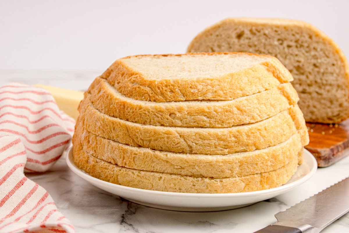 Sliced No-Knead Peasant Bread Sliced no-knead peasant bread showing the soft interior and golden crust