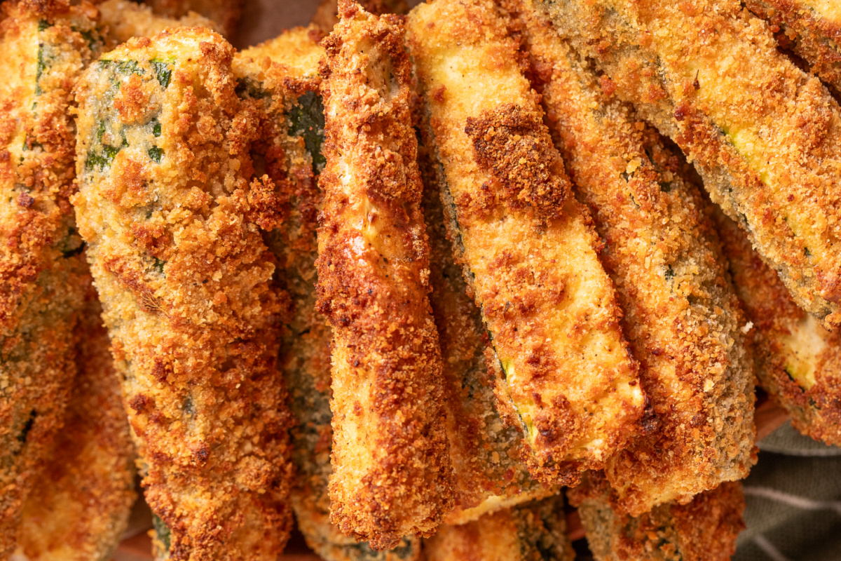 Close-Up of Crispy Air Fryer Zucchini Fries Close-up of crispy Air Fryer Zucchini Fries showing the golden breadcrumb coating.