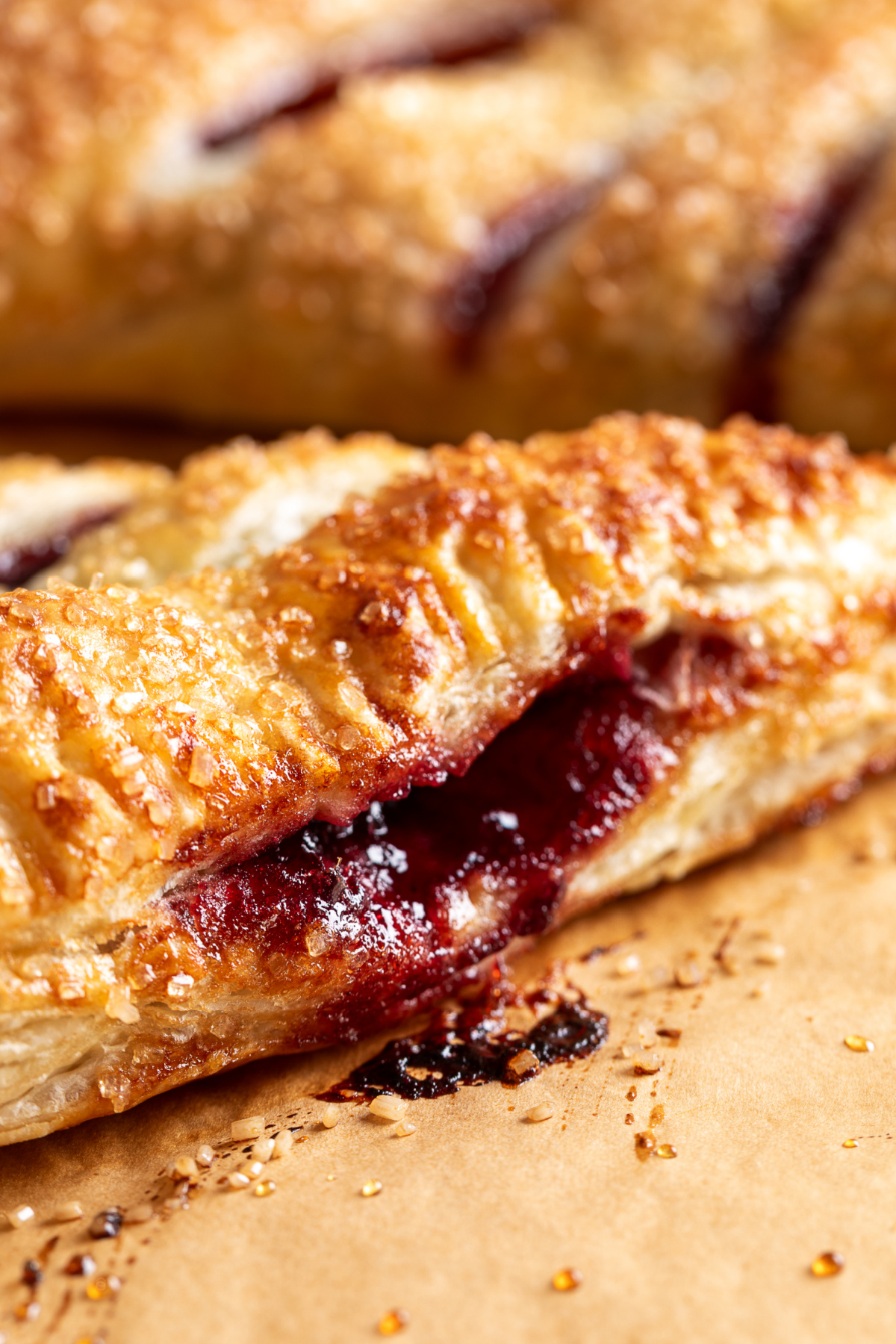 Baked cherry turnovers showing the thick dark cherry filling cherry-turnovers-baked-dark-cherry-filling