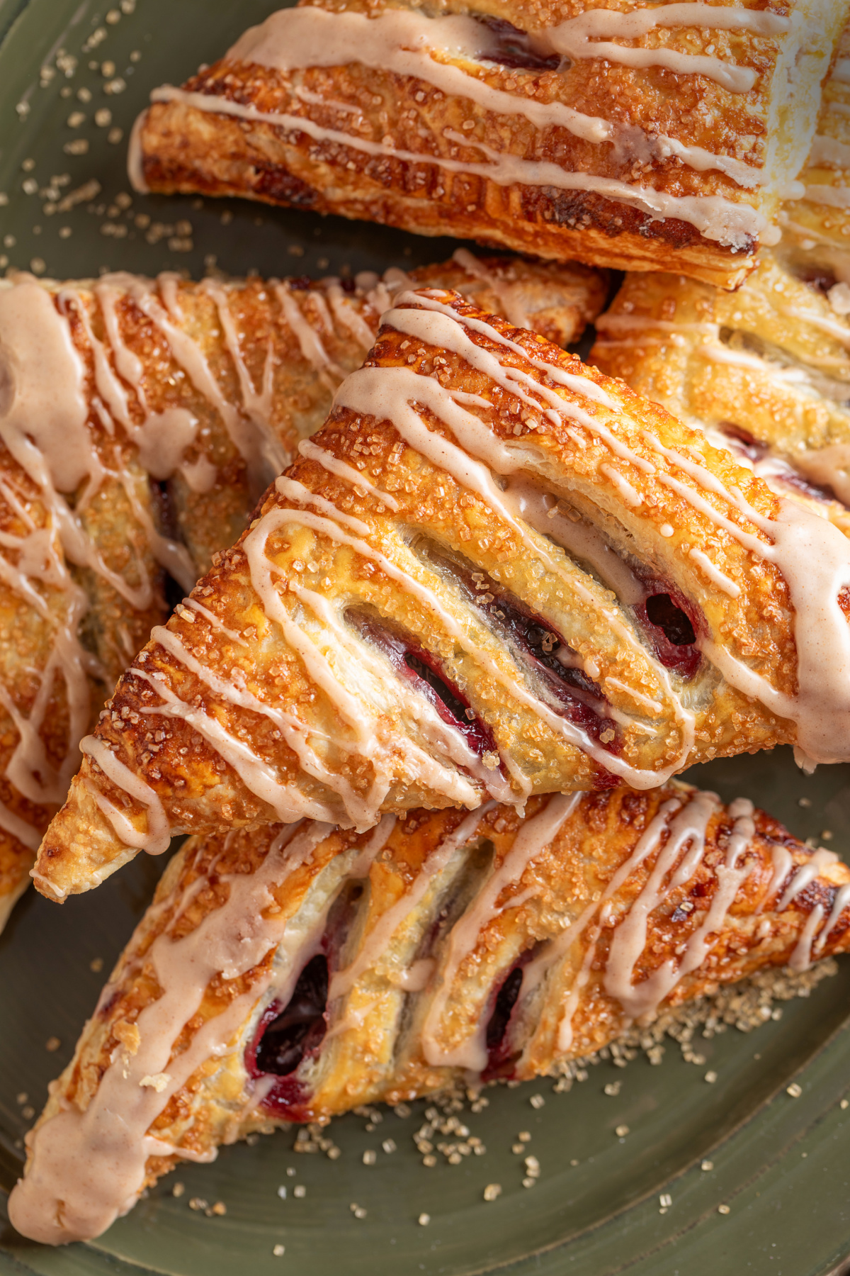 Glazed cherry turnovers made with puff pastry and dark cherry filling cherry-turnovers-dark-cherry-bourbon-glaze