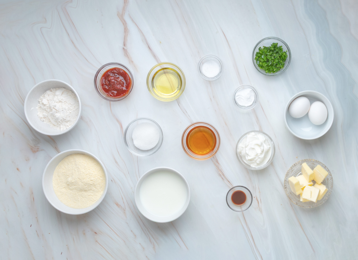 Cornmeal, chipotle, jalapeño, hot honey and buttermilk ingredients for cast-iron cornbread Ingredients for chipotle hot honey skillet cornbread including cornmeal, buttermilk, chipotle, jalapeño, hot honey, sour cream, eggs and butter