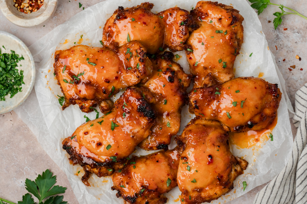Roasted chicken thighs finished with homemade hot honey glaze and fresh parsley.