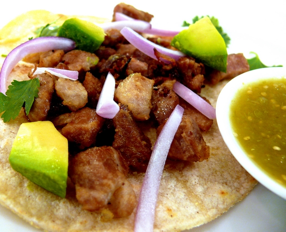 The Best Pork Carnitas are so easy to make they are perfect for a weeknight dinner. Make them for Cinco de Mayo for a delicious, authentic meal. #noblepig #carnitas #tacos #mexican #pork